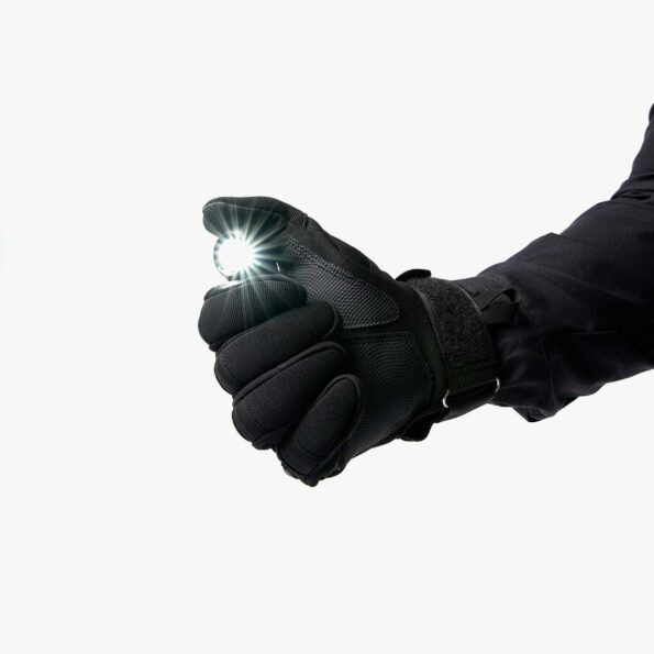 Black tactical angle flashlight activated in gloved hand