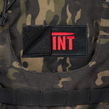 Military embroidered patch attached to tactical backpack